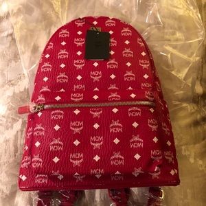 MCM STARK BACKPACK MEDIUM RUBY RED W/ WHITE LOGO
